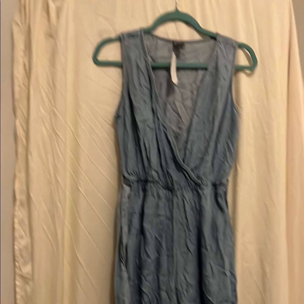 Blue Sleeveless Denim Romper with flared legs